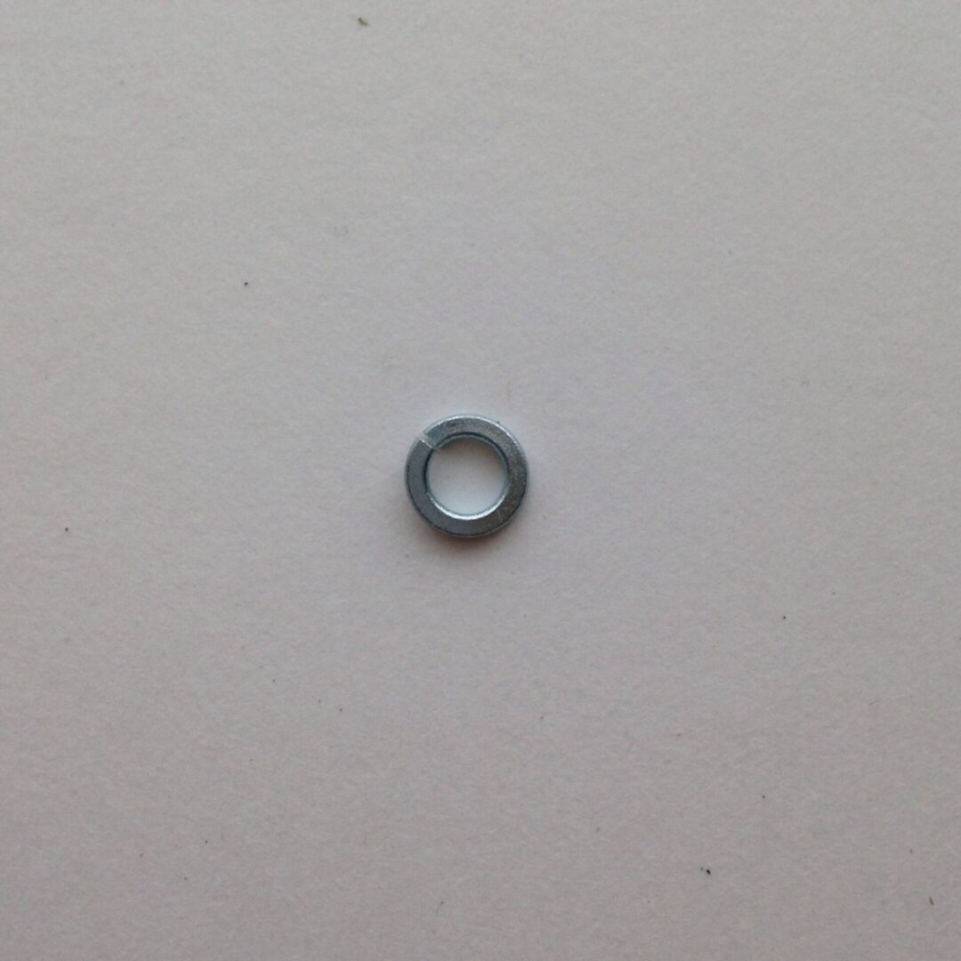 A close up of an open washer on the wall