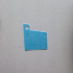A blue piece of paper on the wall