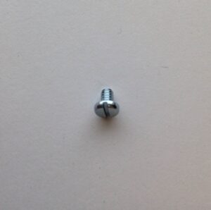 A close up of the head of a screw