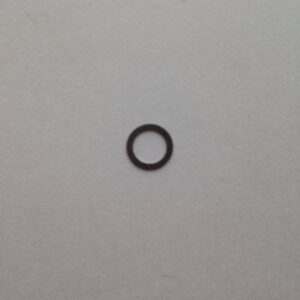 A black ring is sitting on the wall.