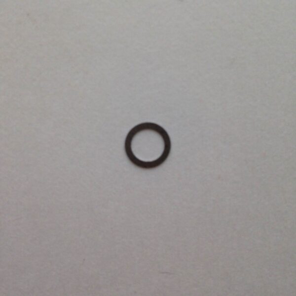 A black ring is sitting on the wall.