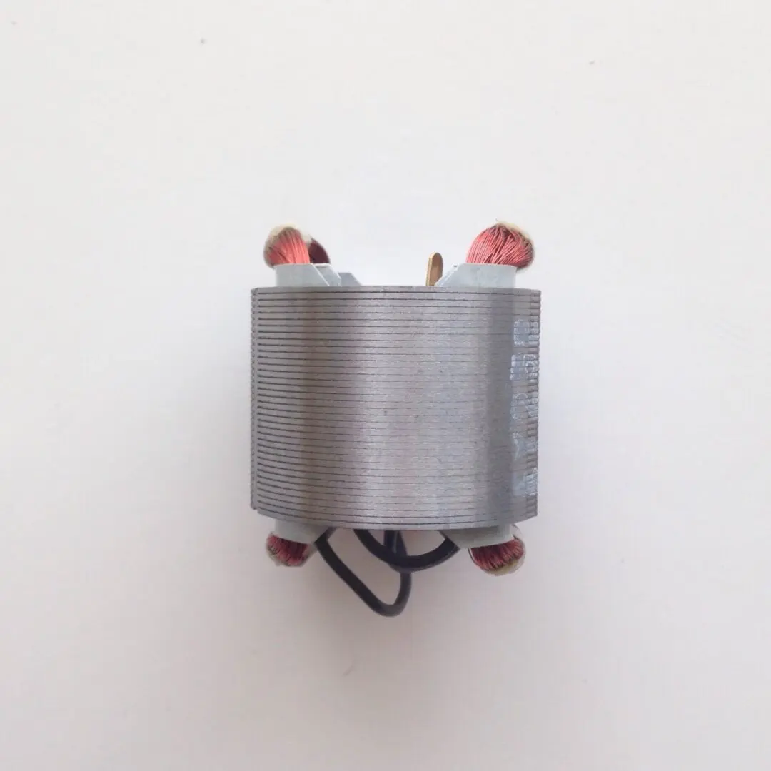 A small motor is attached to the wall.
