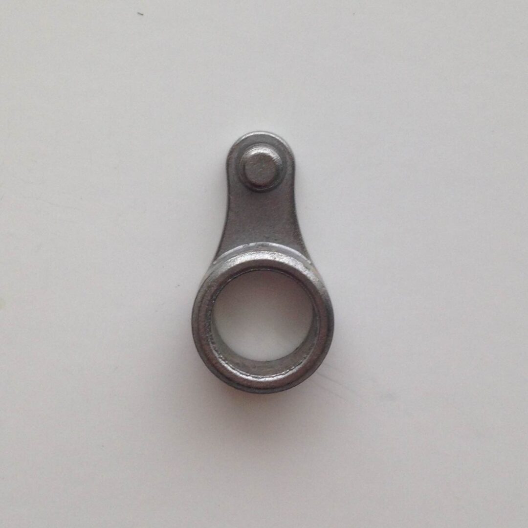 A metal object with one end missing.
