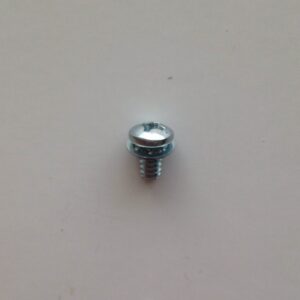 A close up of the bottom end of a screw.