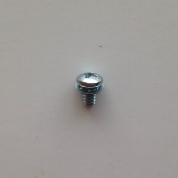 A close up of the bottom end of a screw.