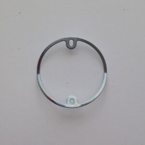 A metal ring with a hole in it