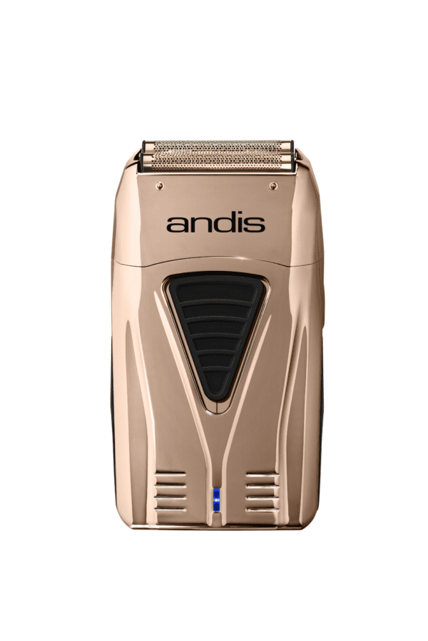 A gold electric razor with blue light on top of it.