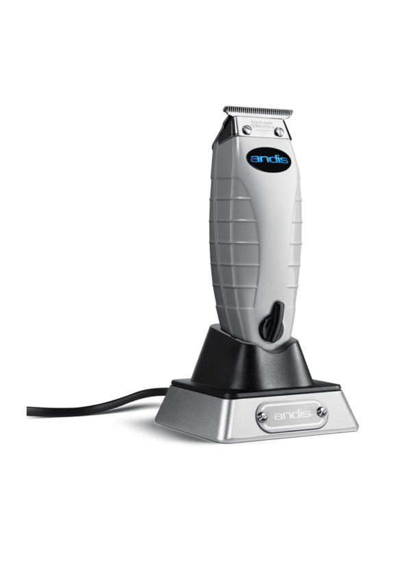 A black and white picture of an electric hair clipper.