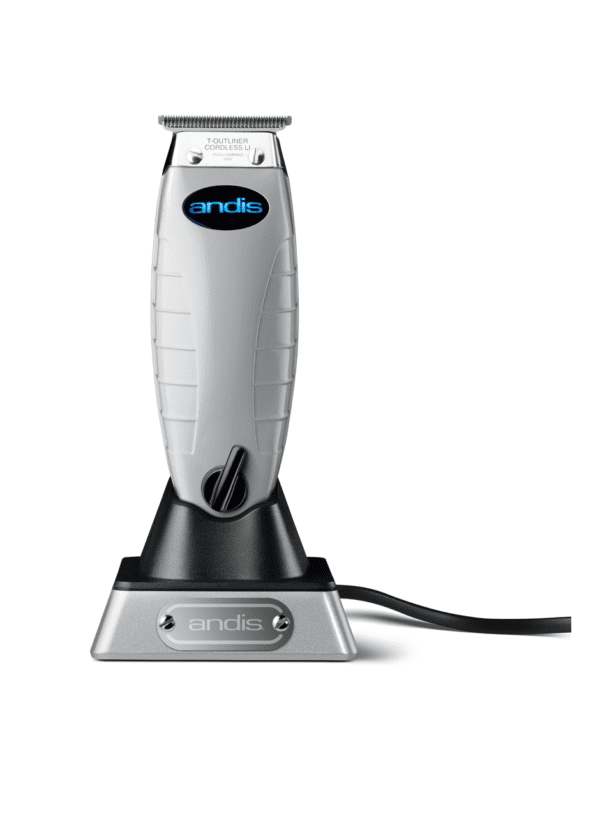 A silver and black electric shaver on top of a stand.