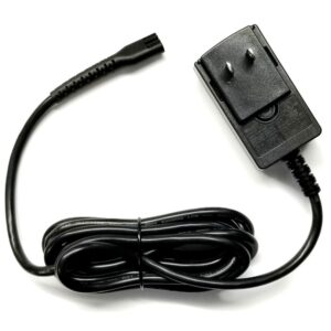 A black power cord with a plug in it.