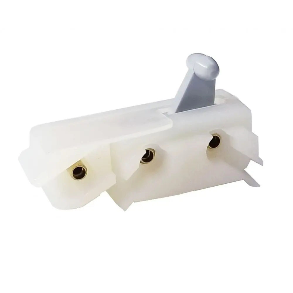 A white plastic piece of equipment with three holes.
