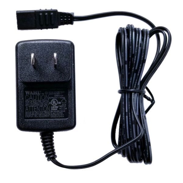 A black charger is connected to the cord.