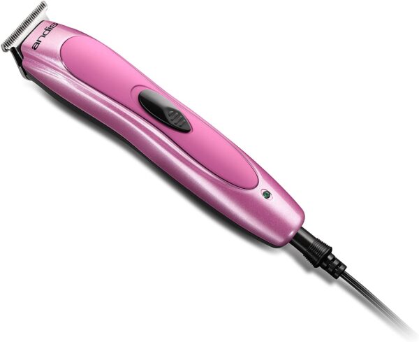 A pink electric hair trimmer is sitting on the floor.