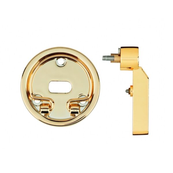 A gold colored door knob and handle set.