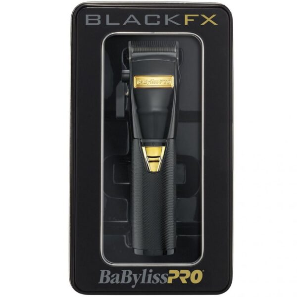 A black and yellow box with a hair trimmer in it
