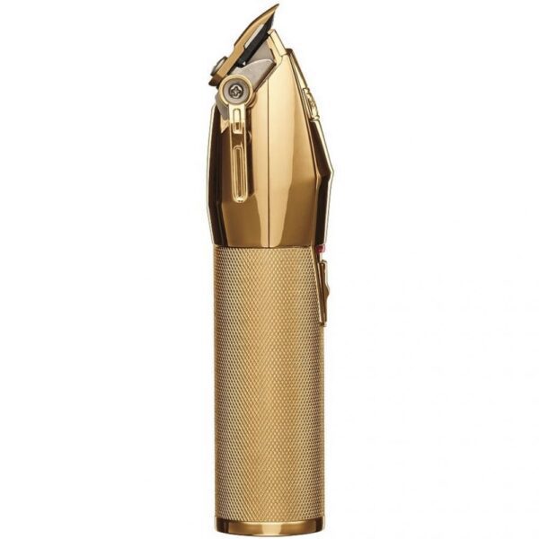 A gold colored pen with a metal tip.