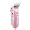 A pink hair trimmer sitting on top of a white table.