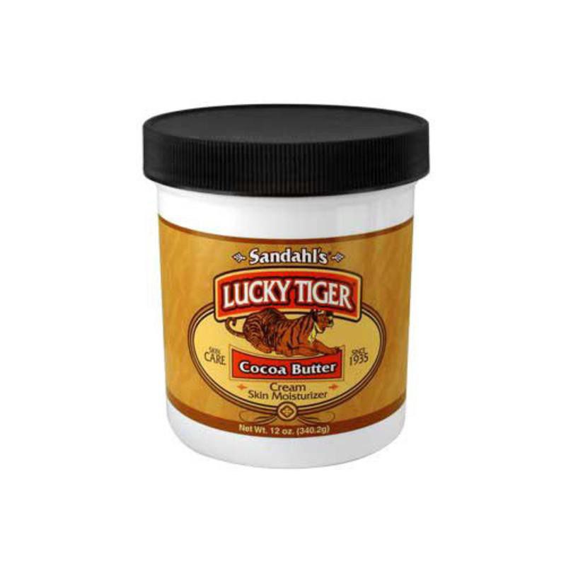 A jar of lucky tiger balm on top of a table.