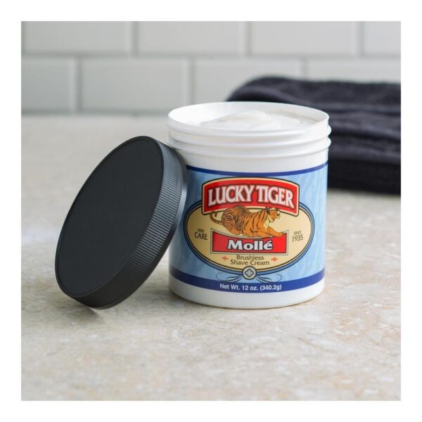 A container of lucky tiger yogurt on top of a counter.