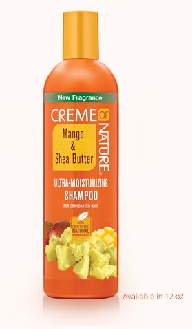 A bottle of creme of nature shampoo.