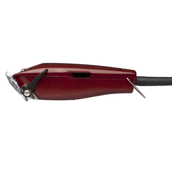 A red electric knife with a black handle.
