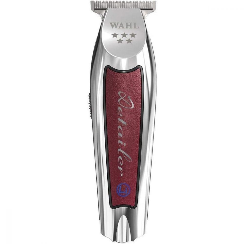 A red and silver electric hair trimmer.