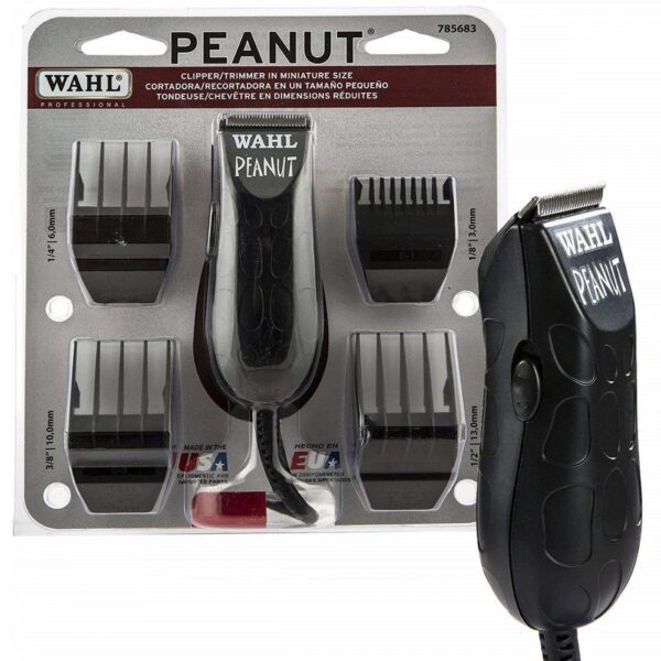 A black peanut hair clipper with six different attachments.