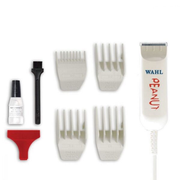 A white and black hair trimmer with four different types of blades.