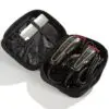 A black bag with some items inside of it