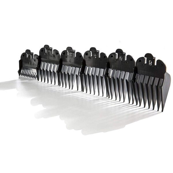 A row of black combs sitting on top of a white table.