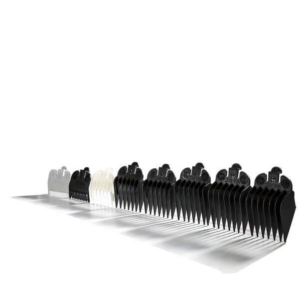 A row of combs are lined up on top of each other.