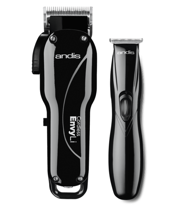 A black and silver electric hair clippers on green background