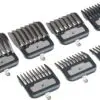 A group of different sized metal combs.