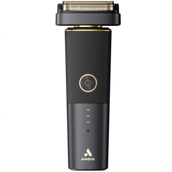 A black and gold electric razor on top of a white table.